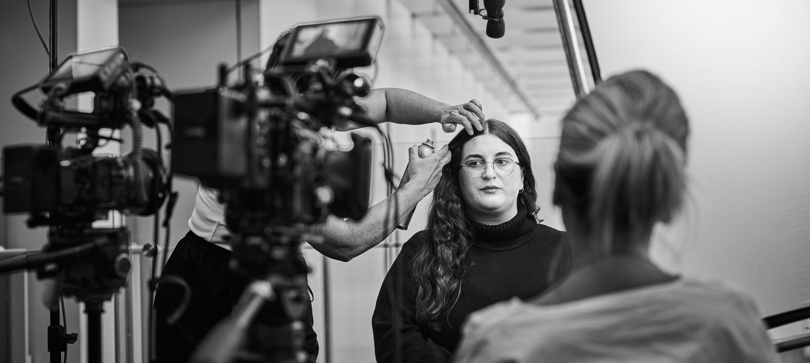 Multi-camera setup with hair and makeup